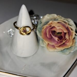 Knot Design Goldtone Ring w/ Red Stone